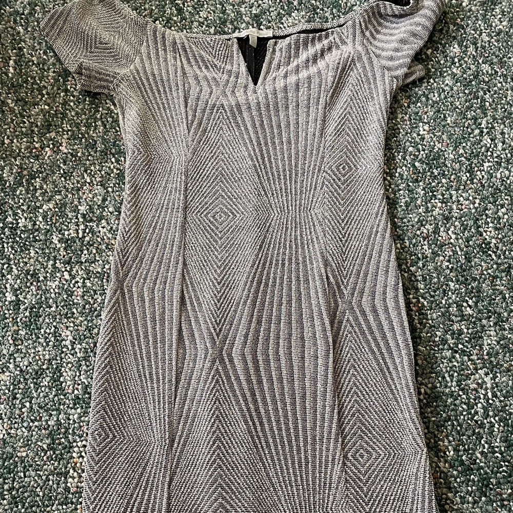 Sparkly body con dress.
